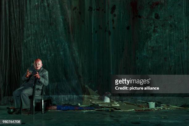 March 2018, Germany, Berlin: The actor Veit Schubert of the 'Berliner Ensemble' tehatre sits on stage during the rehearsal of the play 'Krieg' by...