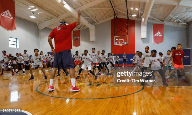 Jerome Williams leads warm up drills during the Young3 Basketball Clinic and Tournament on June 21, 2018 in Houston, Texas.