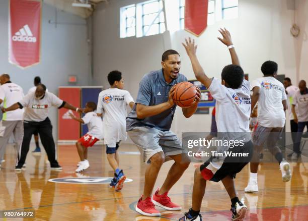 Coach Desmon Farmer gives instruction during the Young3 Basketball Clinic and Tournament on June 21, 2018 in Houston, Texas.