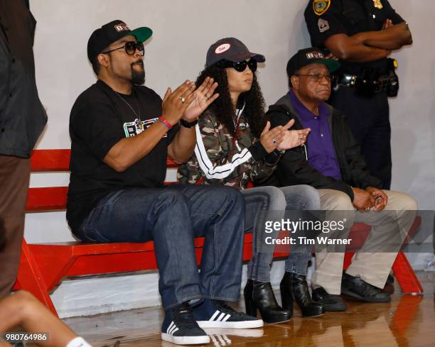 Rap Artist Ice Cube watches action from the sideline during the Young3 Basketball Clinic and Tournament on June 21, 2018 in Houston, Texas.