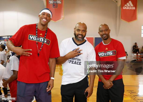 Jerome Williams, Moochie Norris, and T.J. Ford pose for a photo during the Young3 Basketball Clinic and Tournament on June 21, 2018 in Houston, Texas.