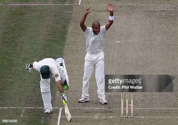 Ricky Ponting of Australia is run out by Daniel Vettori of New Zealand as Jeetan Patel celebrates during day one of the Second Test match between New...