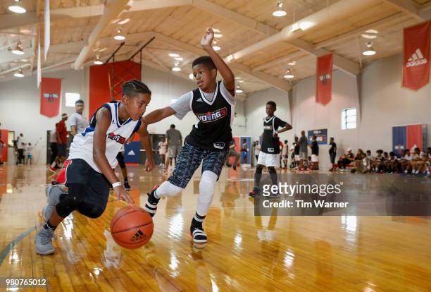 Participants compete during the Young3 Basketball Clinic and Tournament on June 21, 2018 in Houston, Texas.