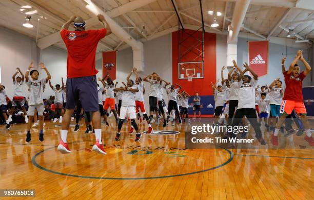 Jerome Williams leads warm up drills during the Young3 Basketball Clinic and Tournament on June 21, 2018 in Houston, Texas.