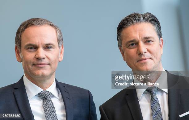 March 2018, Germany, Stuttgart: Oliver Blume , chairman of the Porsche AG, and Lutz Meschke, Deputy Chairman and board member of finance and IT,...