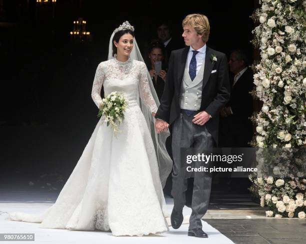 Dpatop - 16 March 2018, Peru, Lima: Prince Christian of Hanover and Alessandra de Osma exit the church after their wedding ceremony in the Basilika...