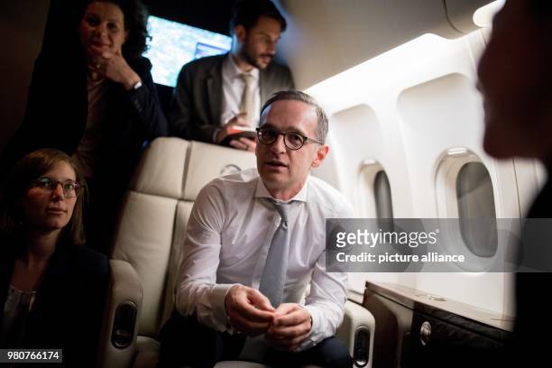 March 2018, Poland, Warsaw: Foreign Minister Heiko Maas speaking to journalists in an Airbus A319 on his return to Berlin after his inaugral visit to...