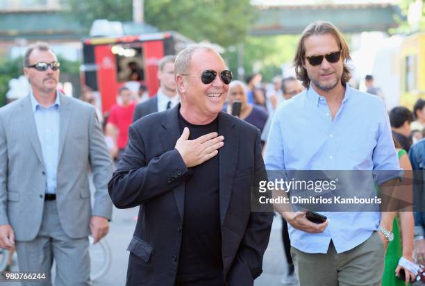 Michael Kors and Lance Le Pere attend as Michael Kors and the New York Restoration Project Celebrate The Opening Of The Essex Street Community Garden...