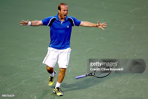 Olivier Rochus of Germany celebrates match point against Novak Djokovic of Serbia during day four of the 2010 Sony Ericsson Open at Crandon Park...