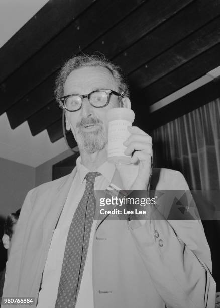British petrologist and optical mineralogist Stuart Olof Agrell with moon dust sample at the Museum of Mineralogy of Cambridge University, UK, 20th...