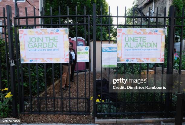 Signage is seen during Michael Kors and the New York Restoration Project Celebrate The Opening Of The Essex Street Community Garden on June 21, 2018...