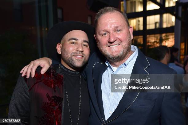 Parson James and amfAR CEO Kevin Robert Frost attends the amfAR GenCure Solstice 2018 on June 21, 2018 in New York City.