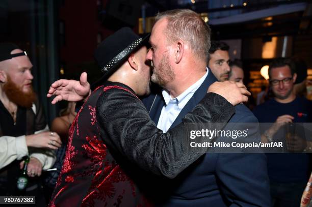 Parson James and amfAR CEO Kevin Robert Frost attends the amfAR GenCure Solstice 2018 on June 21, 2018 in New York City.