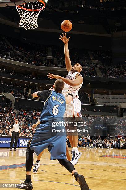 Boris Diaw of the Charlotte Bobcats goes for the layup against Mike Miller of the Washington Wizards on March 26, 2010 at the Time Warner Cable Arena...