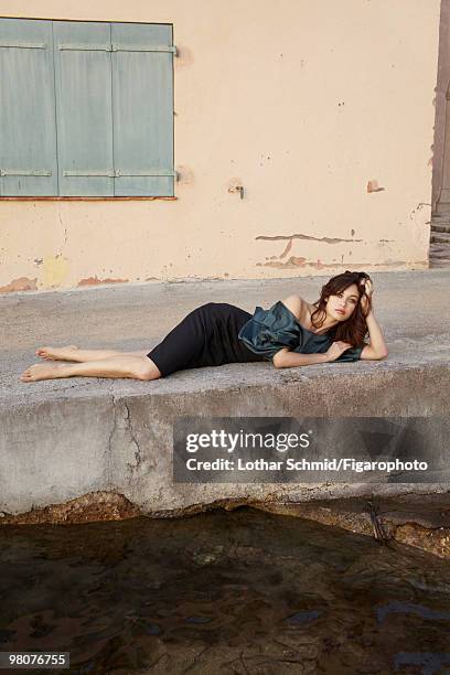 Actress Olga Kurylenko at a portrait session for Madame Figaro in Saint-Tropez, France in June, 2009. PUBLISHED IMAGE. CREDIT MUST READ: Lothar...