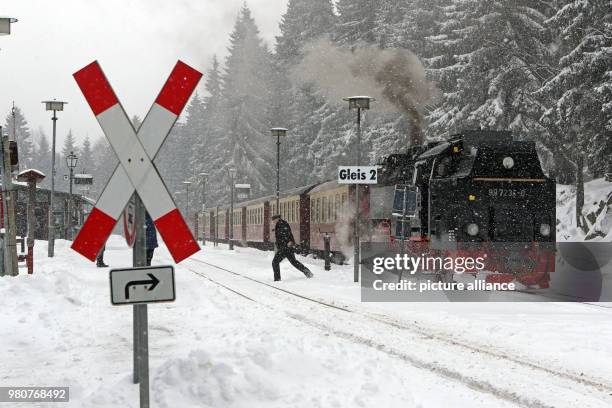 March 2018, Germany, Schierke: A train of the Harzer Schmalspurbahn narrow gauge railway in the snow at Schierke station. The HSB cancelled the train...