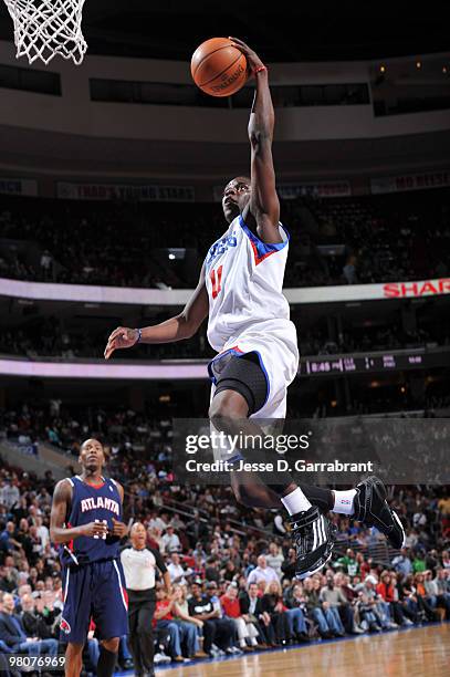 Jrue Holiday of the Philadelphia 76ers shoots against the Atlanta Hawks during the game on March 26, 2010 at the Wachovia Center in Philadelphia,...