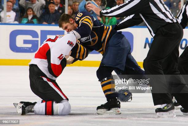 Patrick Kaleta of the Buffalo Sabres fights with Zack Smith of the Ottawa Senators causing his jersey to be pulled over his head on March 26, 2010 at...