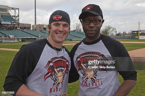 New Orleans Saints kicker Garrett Hartley actor Nelsan Ellis pose at the Vampire Baseball game at Zephyr Field on March 20, 2010 in Metairie,...