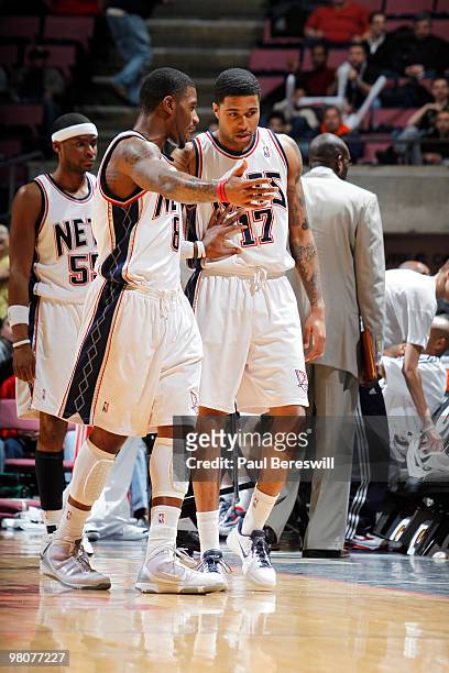 Terrence Williams and Chris Douglas-Roberts of the New Jersey Nets discuss a play while playing the Detroit Pistons during a game on March 26, 2010...