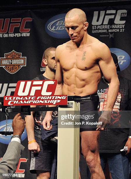 Fighter Georges St-Pierre weighs in for his fight against UFC fighter Dan Hardy for their Championship Welterweight fight at UFC 111: St-Pierre vs....