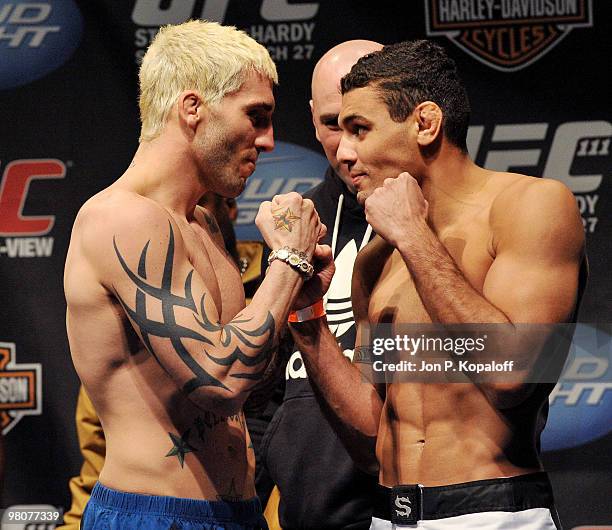 Fighter Kurt Pellegrino faces off against UFC fighter Fabricio Camoes for their Lightweight fight at UFC 111: St-Pierre vs. Hardy Weigh-In on March...