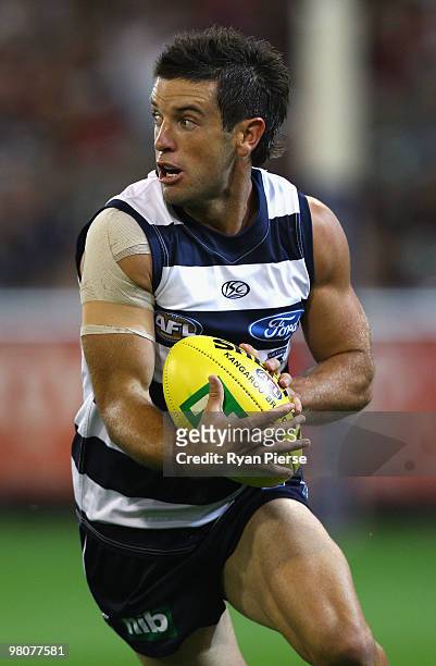 Shannon Byrnes of the Cats in action during the round one AFL match between the Geelong Cats and the Essendon Bombers at Melbourne Cricket Ground on...