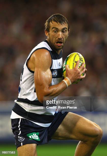 Corey Enright of the Cats in action during the round one AFL match between the Geelong Cats and the Essendon Bombers at Melbourne Cricket Ground on...