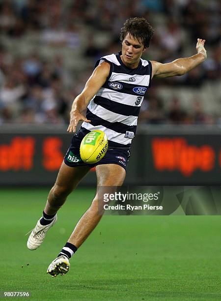 Andrew Mackie of the Cats in action during the round one AFL match between the Geelong Cats and the Essendon Bombers at Melbourne Cricket Ground on...