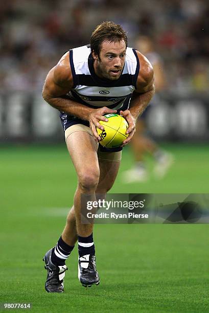 Joel Corey of the Cats in action during the round one AFL match between the Geelong Cats and the Essendon Bombers at Melbourne Cricket Ground on...