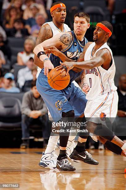 Larry Hughes of the Charlotte Bobcats goes for the steal against Mike Miller of the Washington Wizards on March 26, 2010 at the Time Warner Cable...