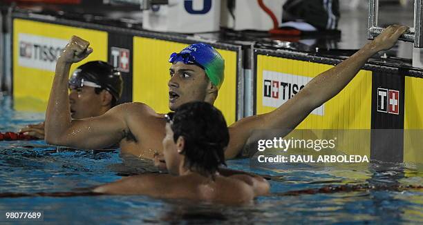 Brazilian swimmer Leonardo Deus celebrates winning the gold in men's 200m backstroke during the IX South American Games in Medellin, Antioquia...
