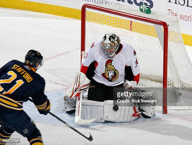 Brian Elliott of the Ottawa Senators makes a save on a deflection by Drew Stafford of the Buffalo Sabres at HSBC Arena on March 26, 2010 in Buffalo,...
