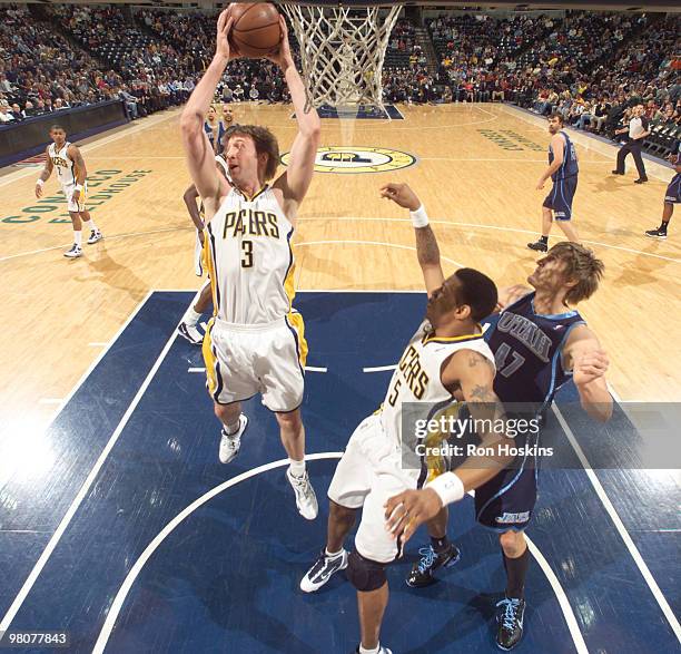 Troy Murphy of the Indiana Pacers rebounds against the Utah Jazz at Conseco Fieldhouse on March 26, 2010 in Indianapolis, Indiana. NOTE TO USER: User...