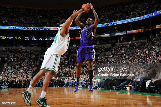 Donte Green of the Sacramento Kings takes the shot against Paul Pierce of the Boston Celtics on March 26, 2010 at the TD Garden in Boston,...