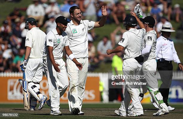 Daniel Vettori of New Zealand celebrates his wicket of Simon Katich of Australia during one of the Second Test match between New Zealand and...