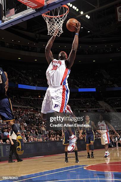 Kwame Brown of the Detroit Pistons shoots a layup during the game against the Indiana Pacers at the Palace of Auburn Hills on March 23, 2010 in...