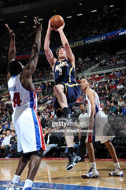 Troy Murphy of the Indiana Pacers goes up for a shot against Jason Maxiell and Tayshaun Prince of the Detroit Pistons during the game at the Palace...