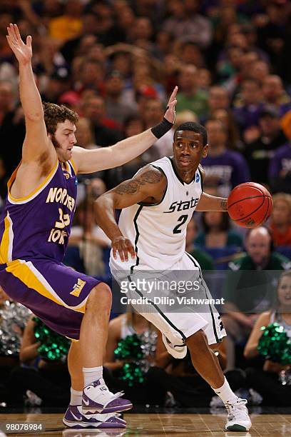 Raymar Morgan of the Michigan State Spartans looks to get past Lucas O'Rear of the Northern Iowa Panthers during the midwest regional semifinal of...