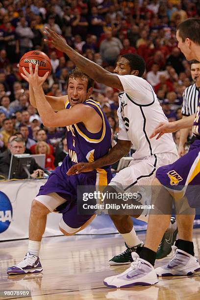 Ali Farokhmanesh of the Northern Iowa Panthers drives drives to the basket against the Michigan State Spartans during the midwest regional semifinal...