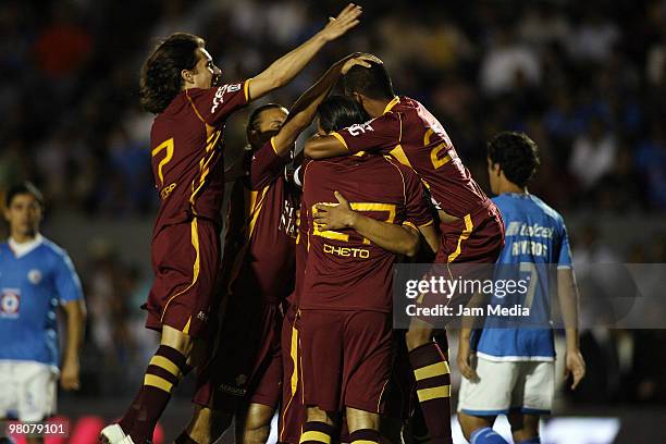 Estudiante's player Osvaldo Alanis celebrates with teammates his scored goal against Cruz Azul their match as part of the Bicentenario 2010...