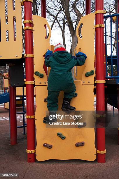 winter at the playground - lisa stokes stock pictures, royalty-free photos & images