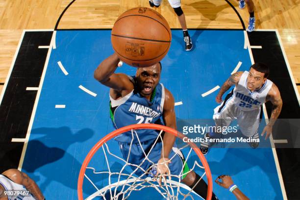 Al Jefferson of the Minnesota Timberwolves shoots against the Orlando Magic during the game on March 26, 2010 at Amway Arena in Orlando, Florida....