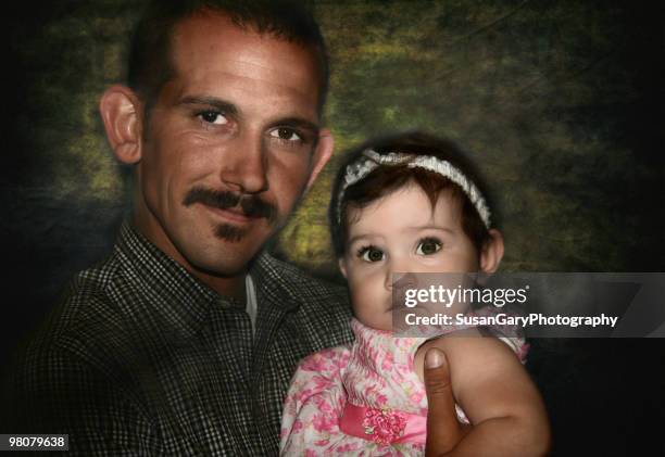 proud father and baby girl - gary bond stock pictures, royalty-free photos & images