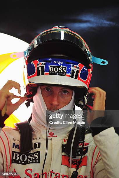 Jenson Button of Great Britain and McLaren Mercedes prepares to drive during the final practice session prior to qualifying for the Australian...