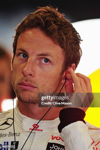 Jenson Button of Great Britain and McLaren Mercedes prepares to drive during the final practice session prior to qualifying for the Australian...