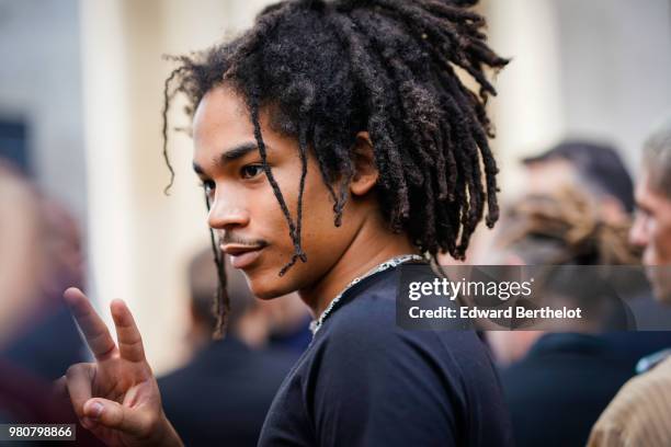 Luka Sabbat wears a black t-shirt, black pants, outside Rick Owens, during Paris Fashion Week - Menswear Spring-Summer 2019, on June 21, 2018 in...