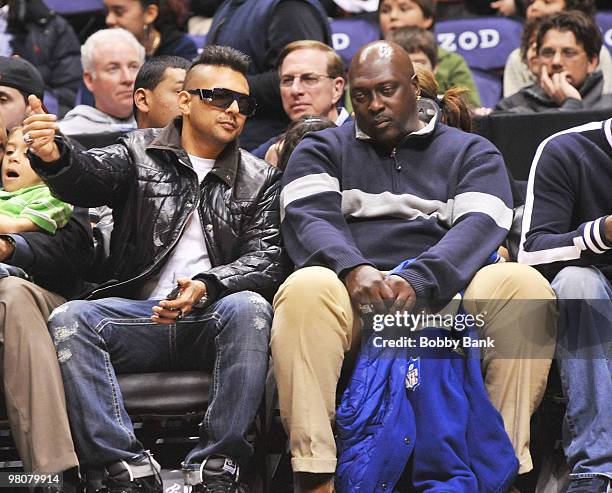 Singer Sean Paul and former New York Giants running back Ottis Anderson attend the a game between the Detroit Pistons and the New Jersey Nets at the...