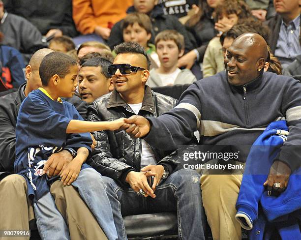 Singer Sean Paul and former New York Giants running back Ottis Anderson attend the a game between the Detroit Pistons and the New Jersey Nets at the...