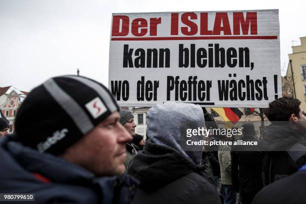 March 2018, Germany, Cottbus: Participants in an anti-refugee demonstration by the group "Zukunft Heimat". Photo: Carsten Koall/dpa
